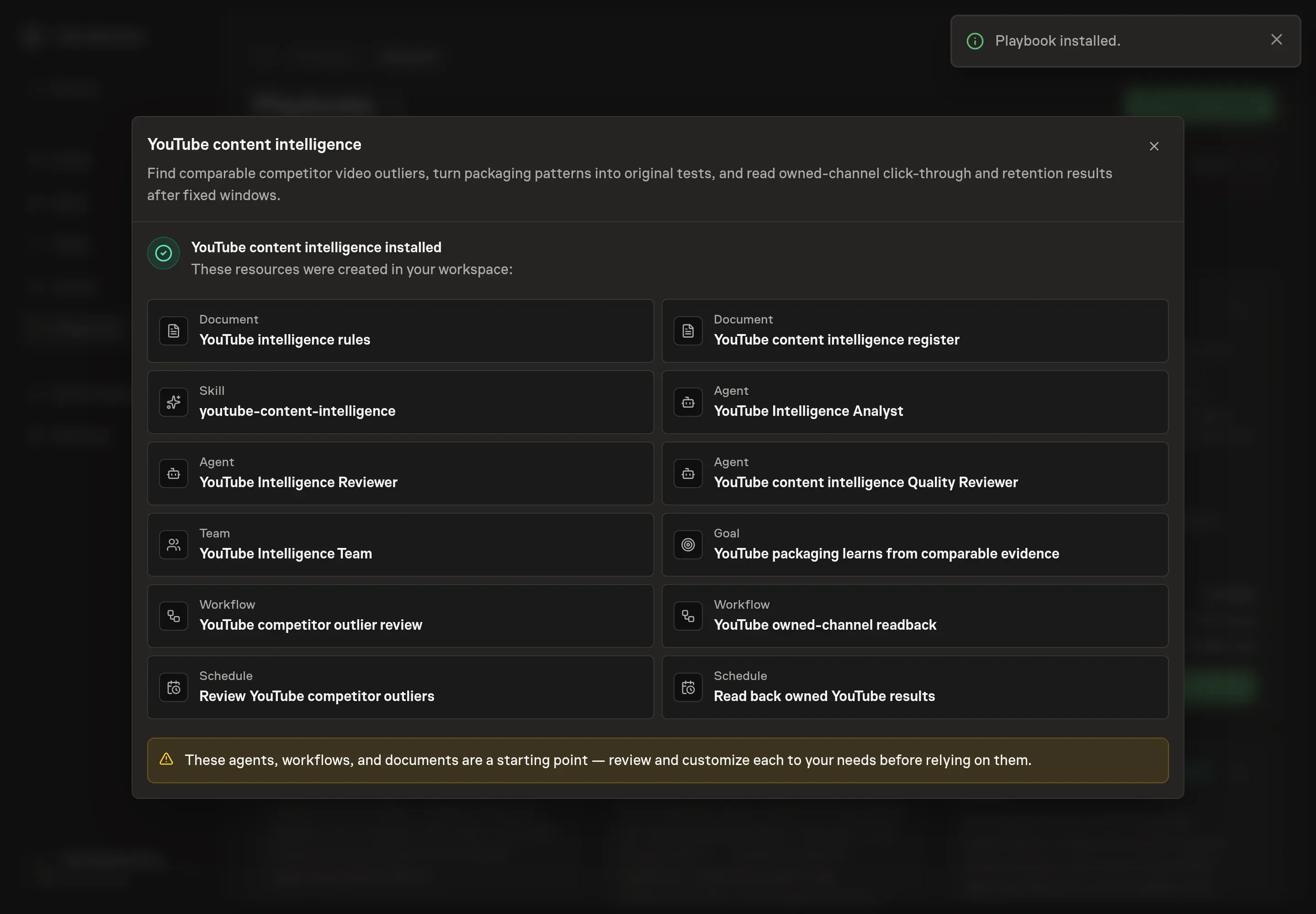 The install confirmation listing the YouTube intelligence rules, register, agents, team, workflows, skill, goal, and schedules