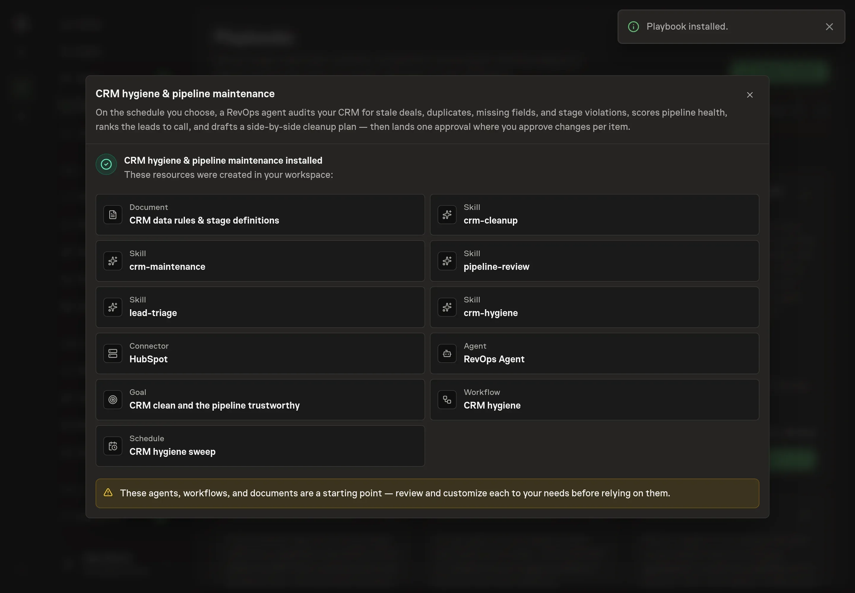 The install confirmation listing the created data rules document, all five skills, the HubSpot connection, the RevOps Agent, the goal, the workflow, and the hygiene schedule, with a Playbook installed notice