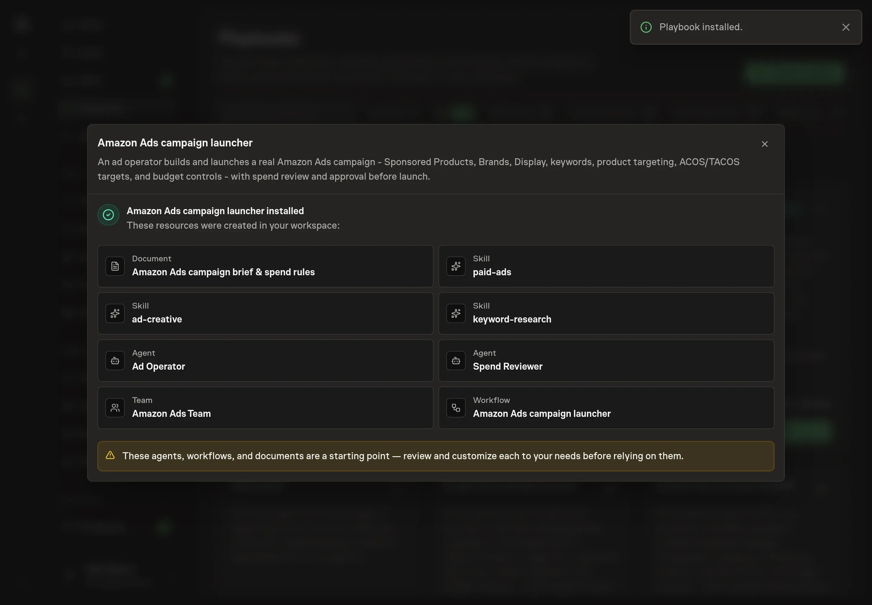 The install confirmation listing the created agents, team, workflow, campaign brief document, and skills, with a Playbook installed notice