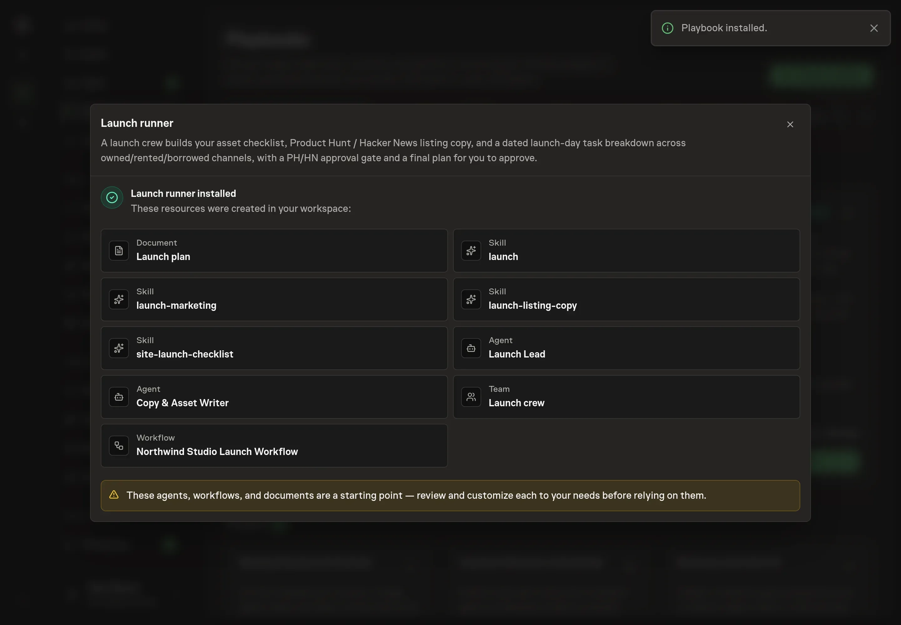 The install confirmation listing the Launch plan, launch skills, two launch agents, the launch crew, and the workflow, with a Playbook installed notice